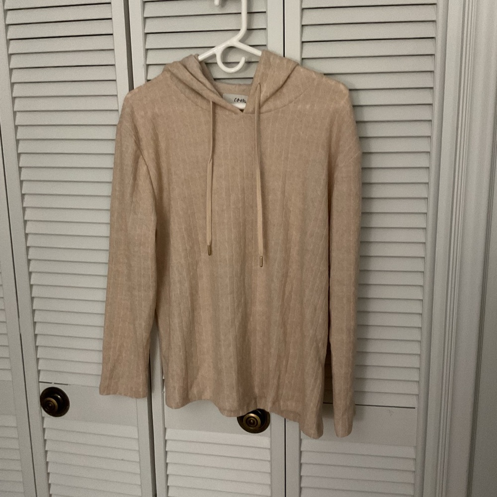 Women’s 2 piece lounging set. Very soft. Hoodie and loose banded leg pants.